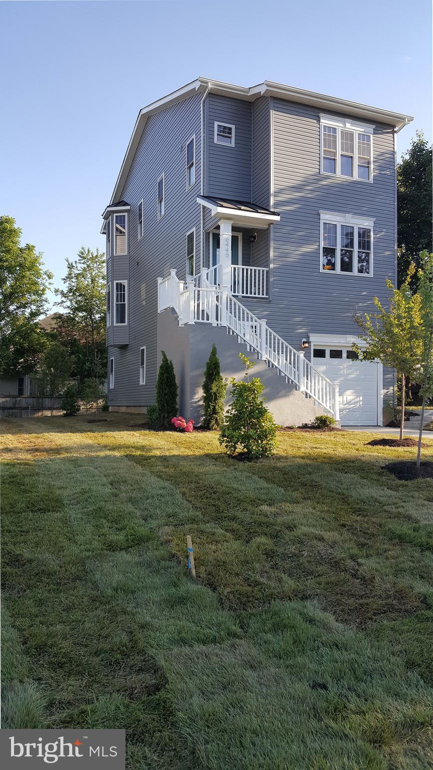 6445 First Street Alexandria, VA 22312 - Photo 26 of 28 a view of a house with a swimming pool