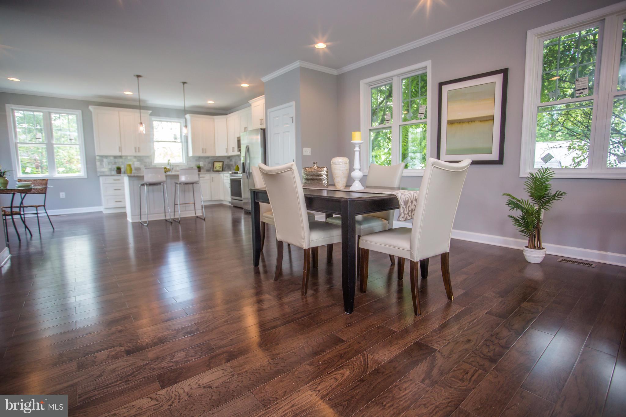 6445 First Street Alexandria, VA 22312 - Photo 27 of 28 a view of a dining room with furniture window and wooden floor