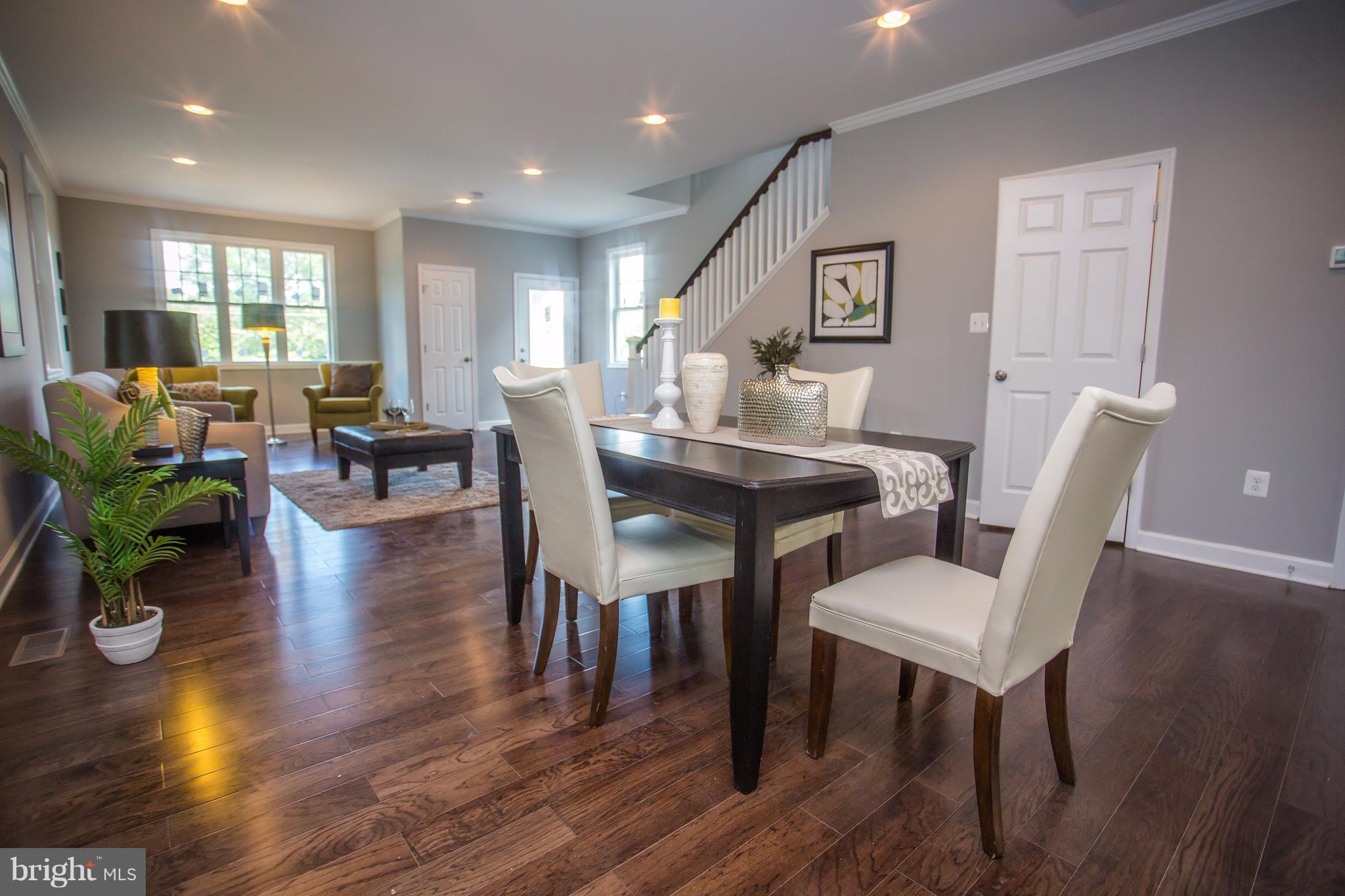 6445 First Street Alexandria, VA 22312 - Photo 28 of 28 a view of a dining room with furniture window and wooden floor