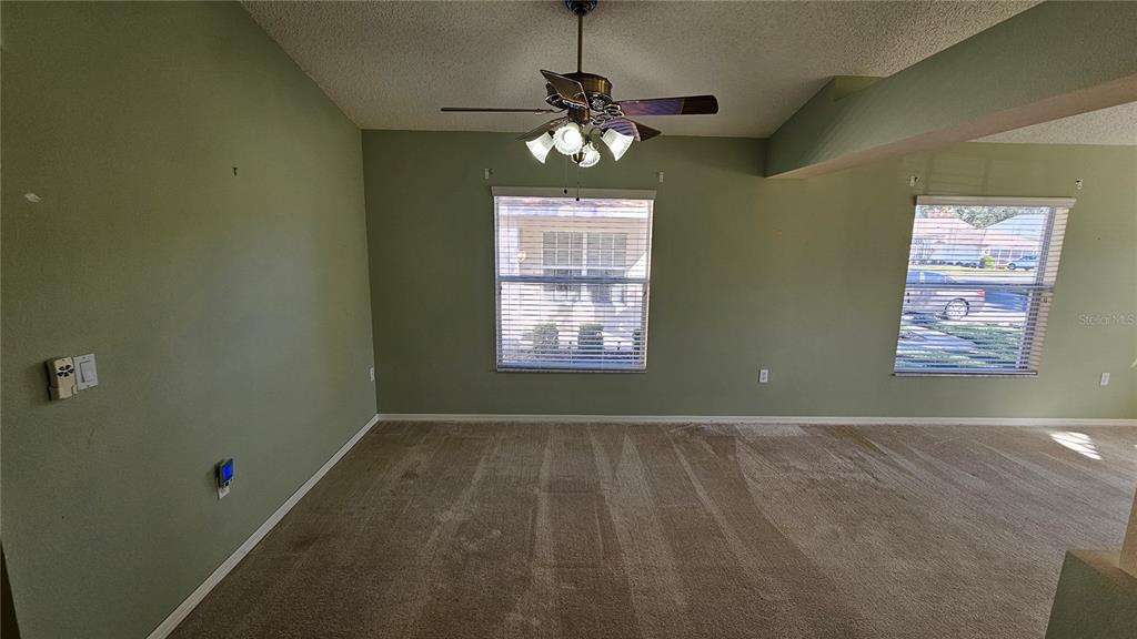371 Quane Avenue Spring Hill, FL 34609 - Photo 11 of 45 a view of livingroom with window