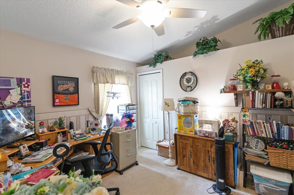 371 Quane Avenue Spring Hill, FL 34609 - Photo 25 of 45 a view of a workspace with furniture and toys