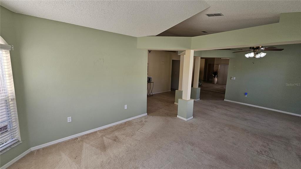371 Quane Avenue Spring Hill, FL 34609 - Photo 30 of 45 an empty room with an entryway
