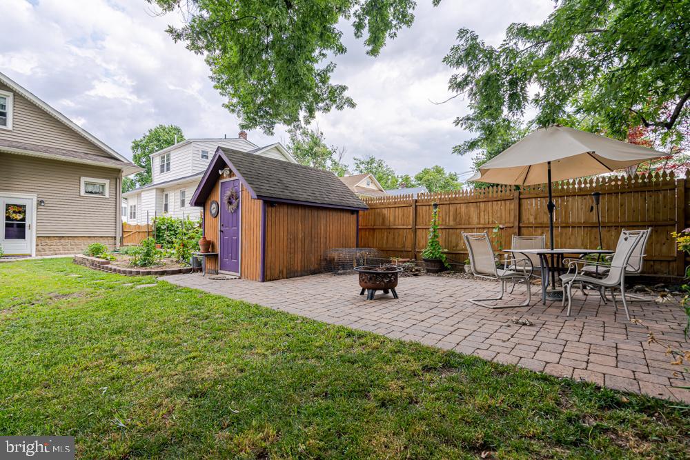 159 Yale Road Audubon, NJ 08106 - Photo 4 of 36 Rear Paver Seating Area