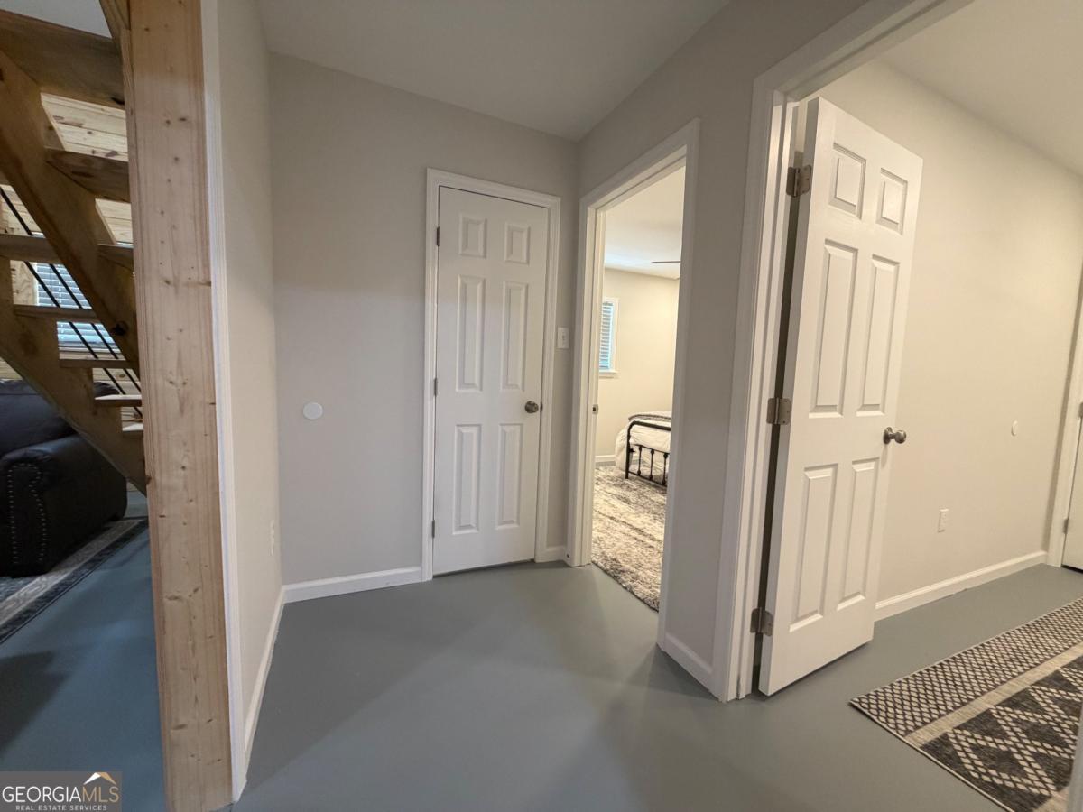 111 Dead River Road Glenwood, GA 30428 - Photo 22 of 40 an empty room with windows