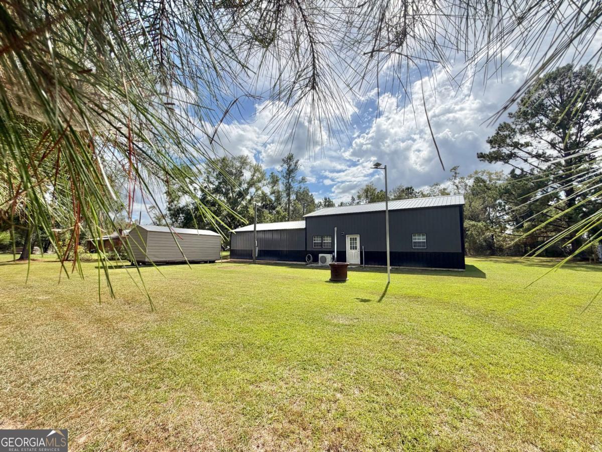 111 Dead River Road Glenwood, GA 30428 - Photo 26 of 39 a view of an outdoor space and yard