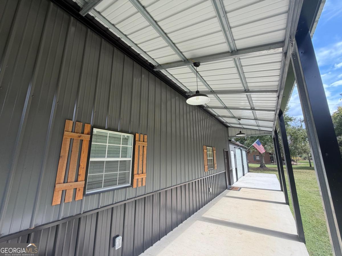 111 Dead River Road Glenwood, GA 30428 - Photo 4 of 39 a view of a balcony