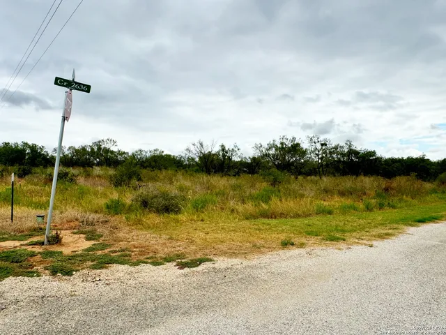 a view of a lake with a big yard