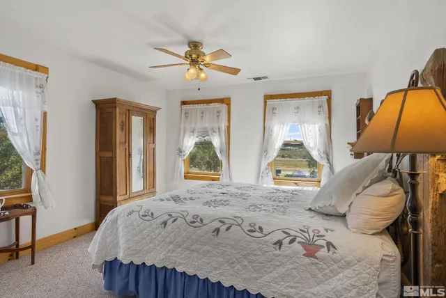 a room with furniture and pool table