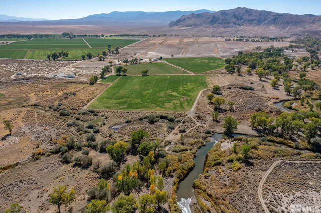 an aerial view of a house with a garden
