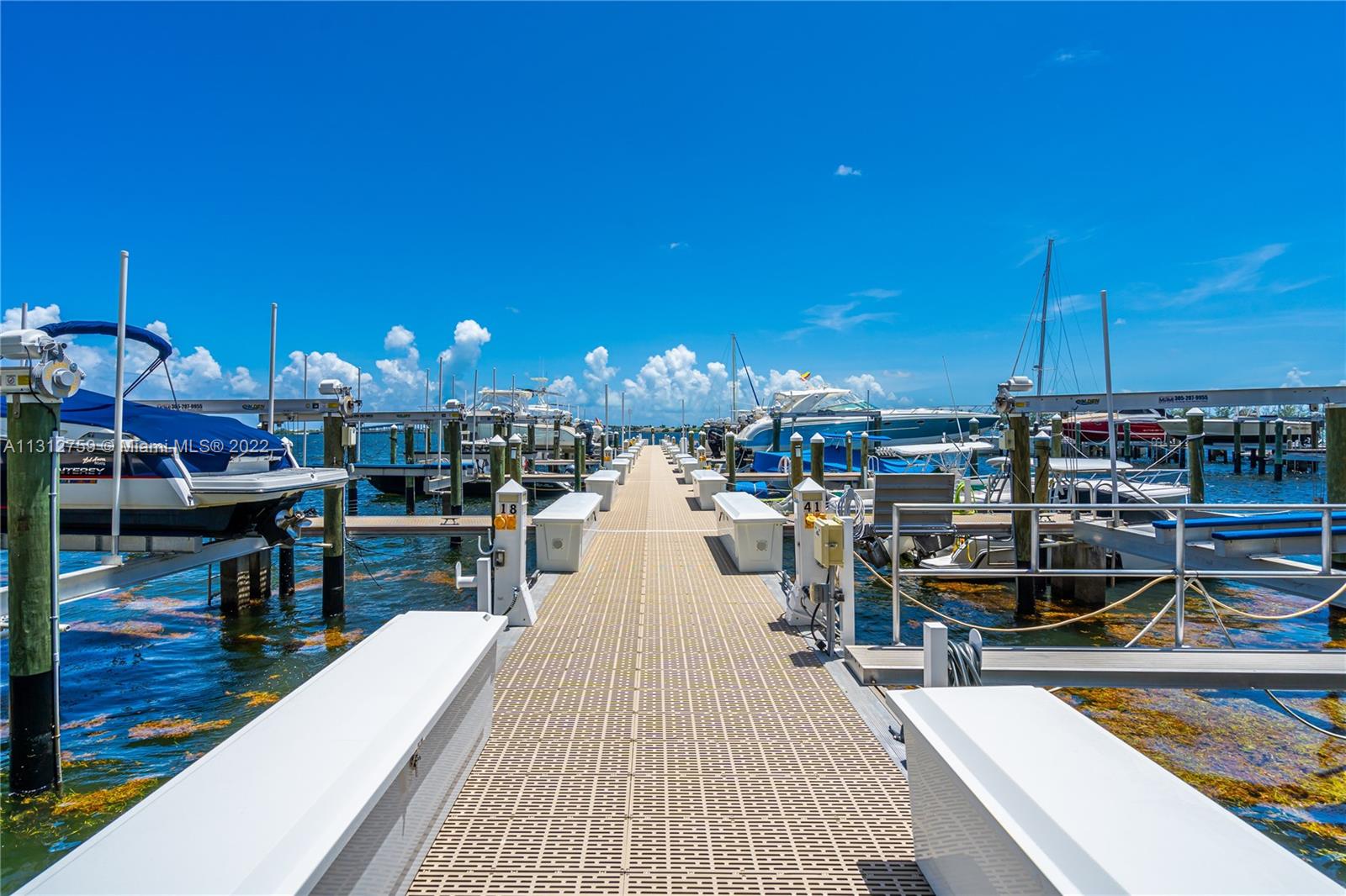 1901 Brickell Avenue Miami, FL 33129 - Photo 3 of 3 a view of a swimming pool with outdoor seating