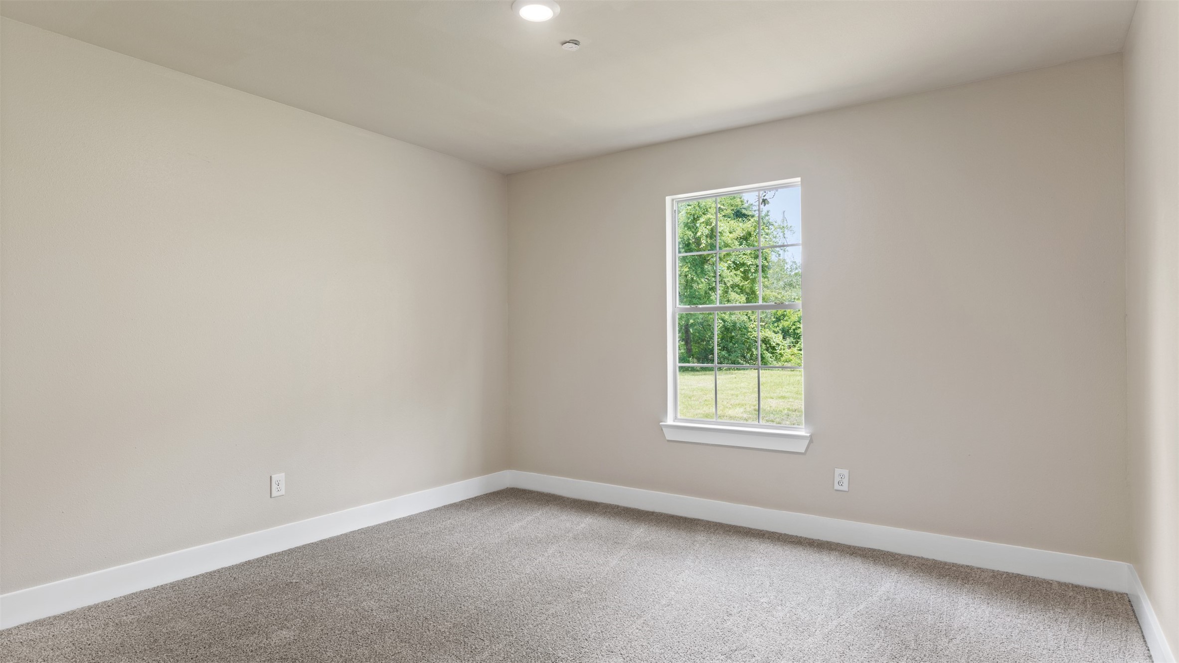 10308 Ehlers Road Conroe, TX 77302 - Photo 14 of 31 an empty room with a window