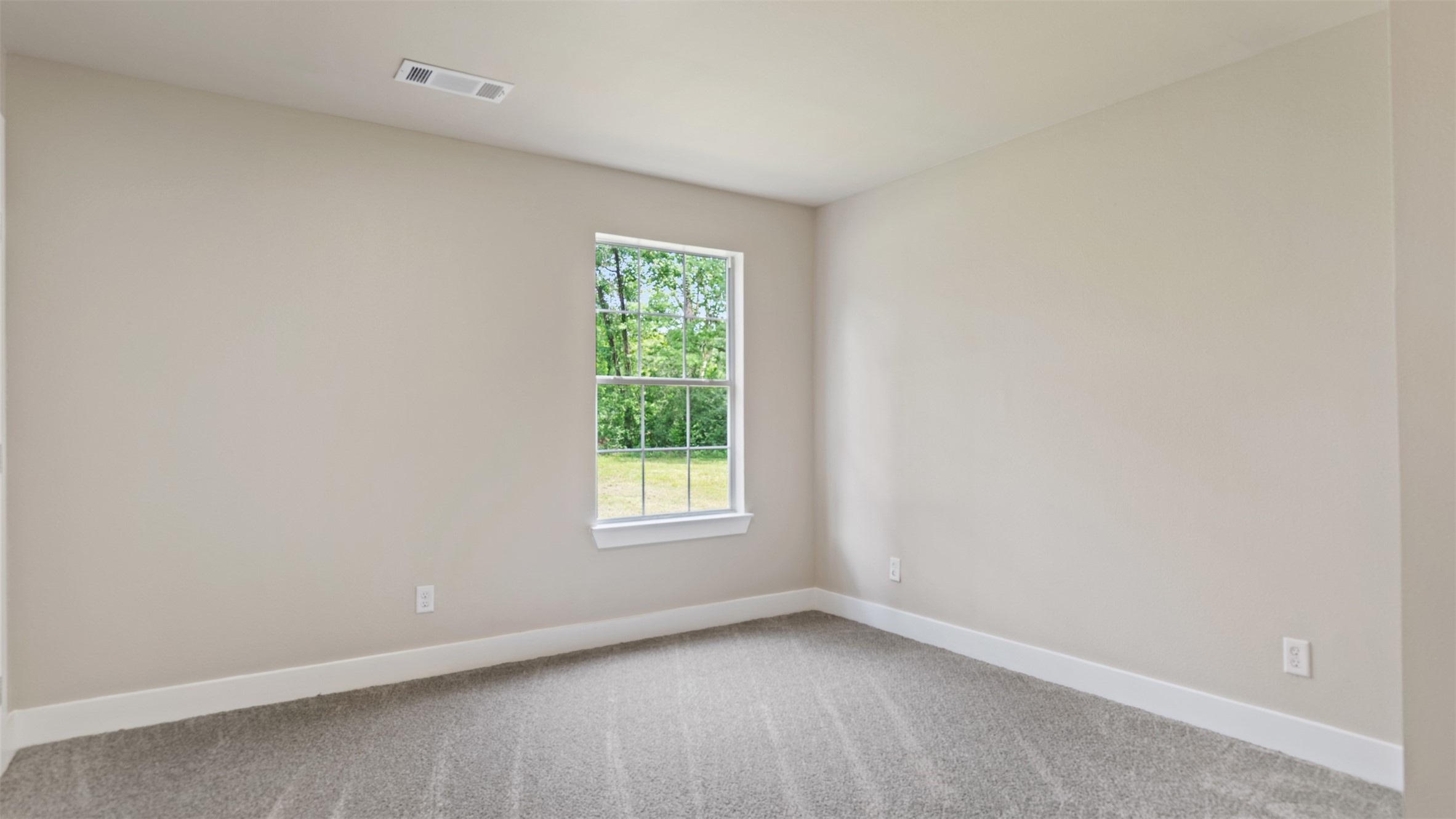 10308 Ehlers Road Conroe, TX 77302 - Photo 15 of 31 an empty room with a window