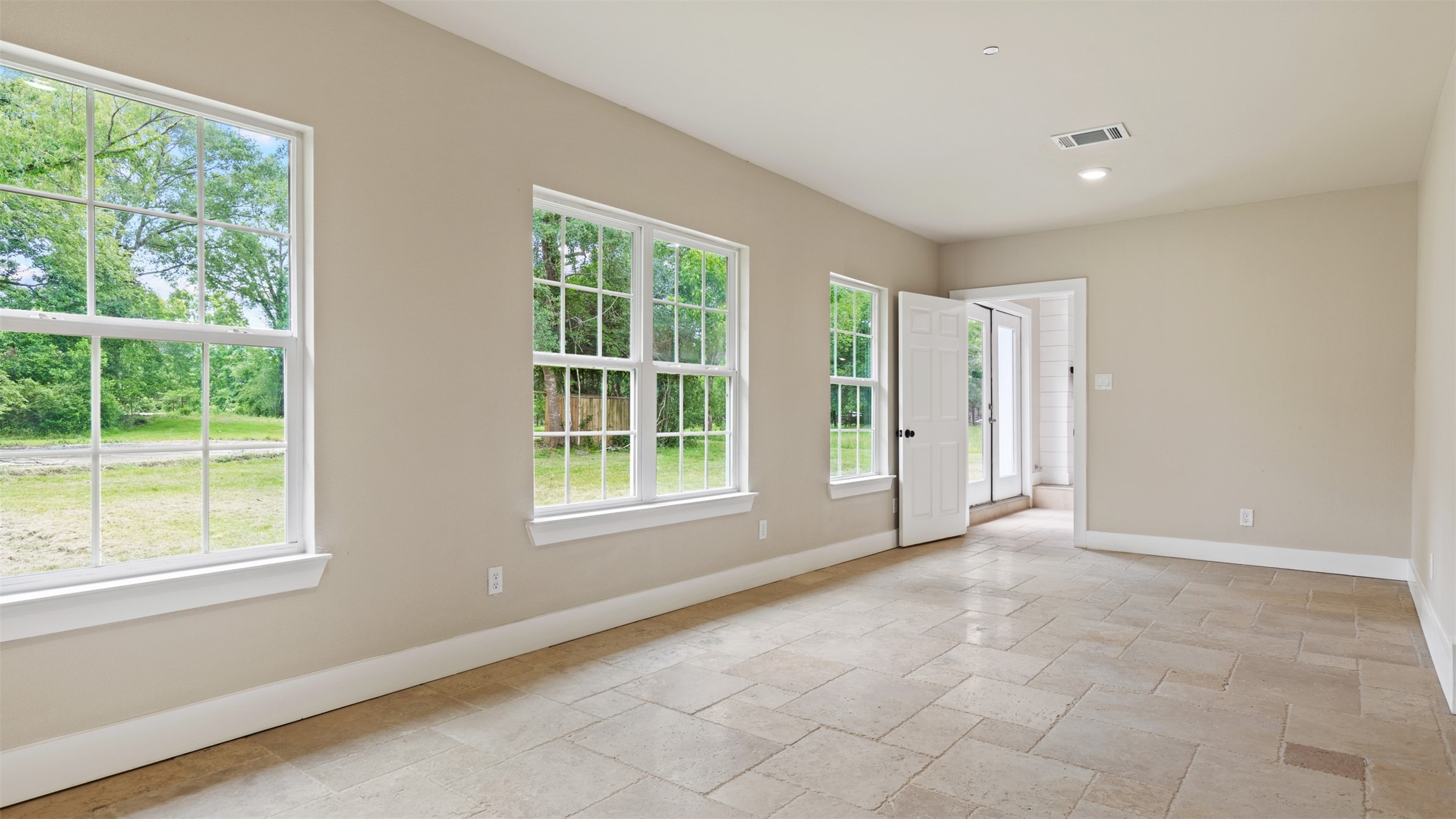 10308 Ehlers Road Conroe, TX 77302 - Photo 26 of 31 a view of an empty room with a window