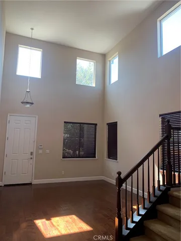 a view of mini theater with wooden floor