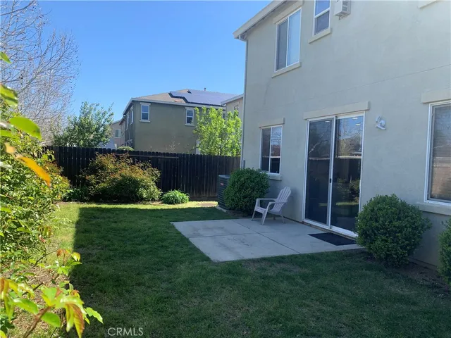 a view of a back yard of the house