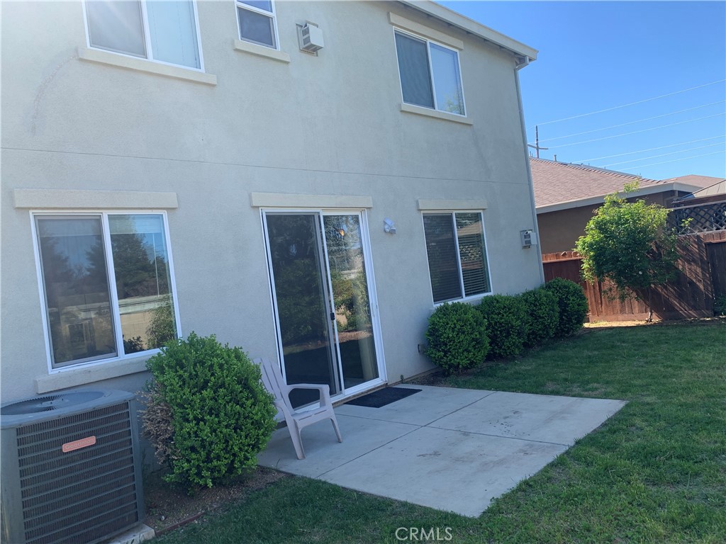 538 Burnt Ranch Way Chico, CA 95973 - Photo 3 of 34 front view of a house with a yard