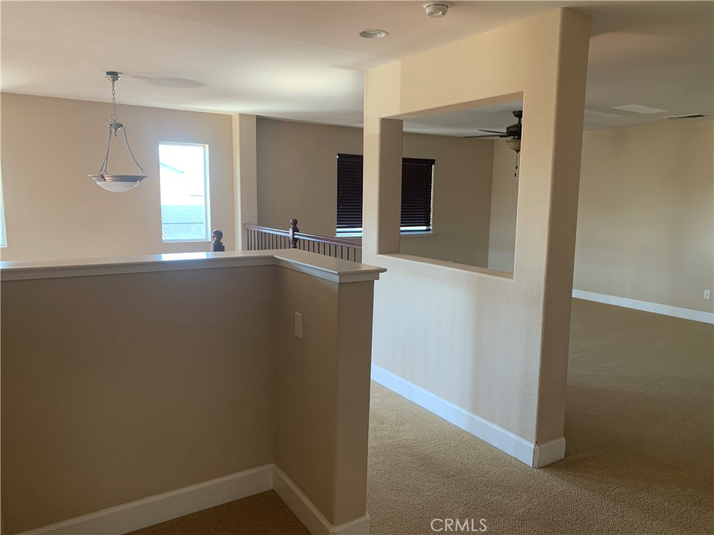 538 Burnt Ranch Way Chico, CA 95973 - Photo 31 of 34 an empty room with window and mirror