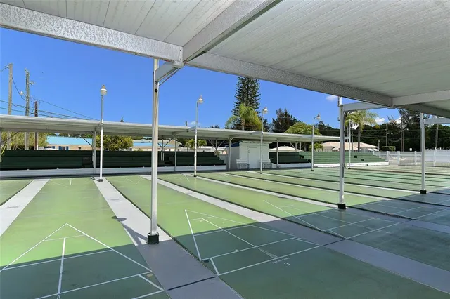 an aerial view of a house with a lake view
