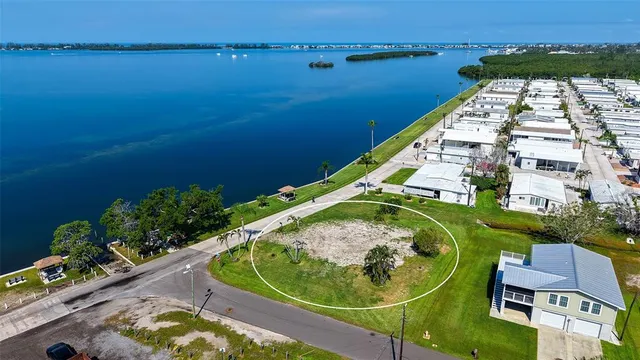 a view of swimming pool with a table and chairs