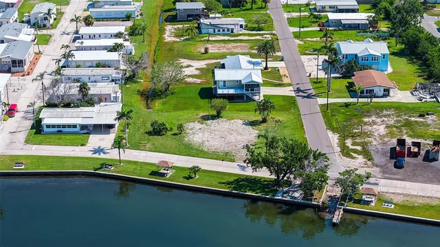 an aerial view of a house having yard