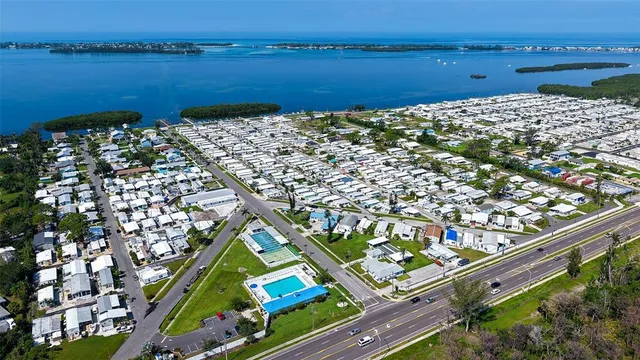 a view of a lake with a big yard