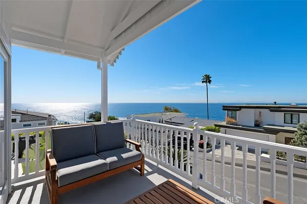 a view of balcony with furniture