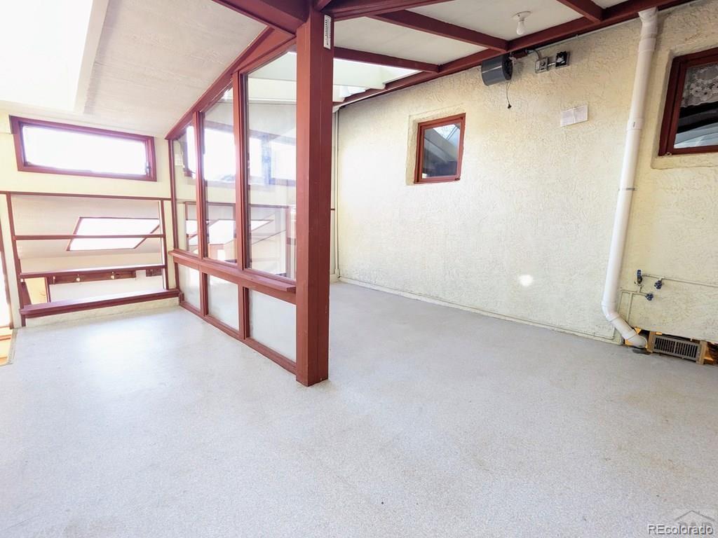 8140 Table Mountain Road Rye, CO 81069 - Photo 20 of 49 an empty room with windows