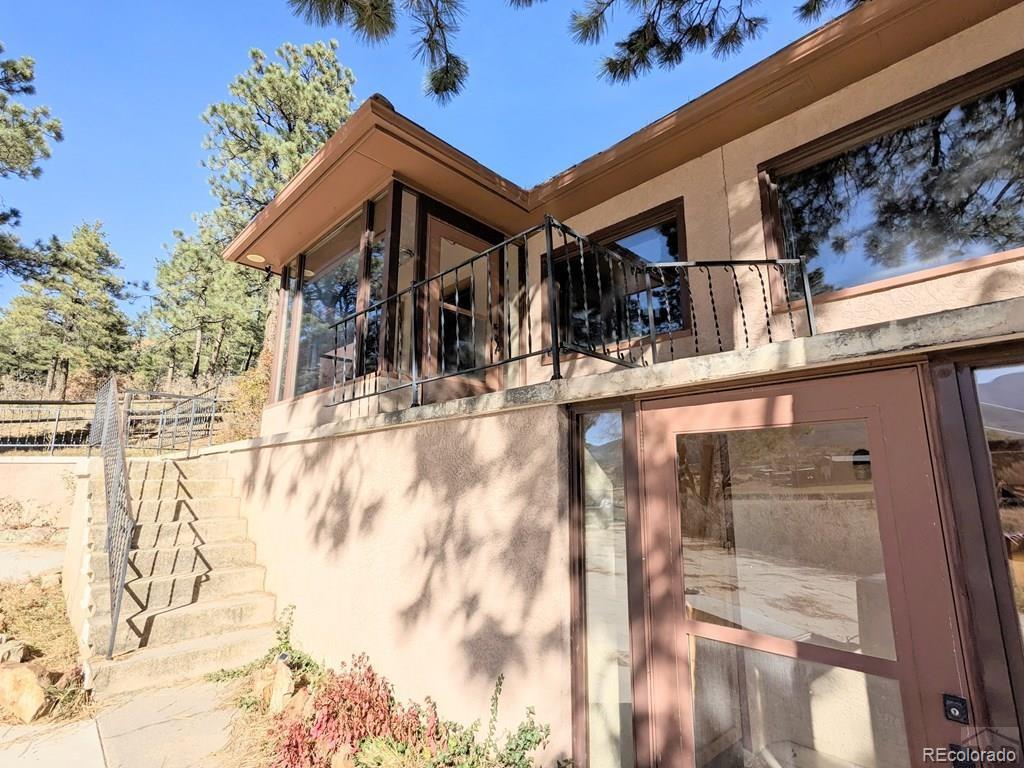 8140 Table Mountain Road Rye, CO 81069 - Photo 2 of 49 a view of a building with a street