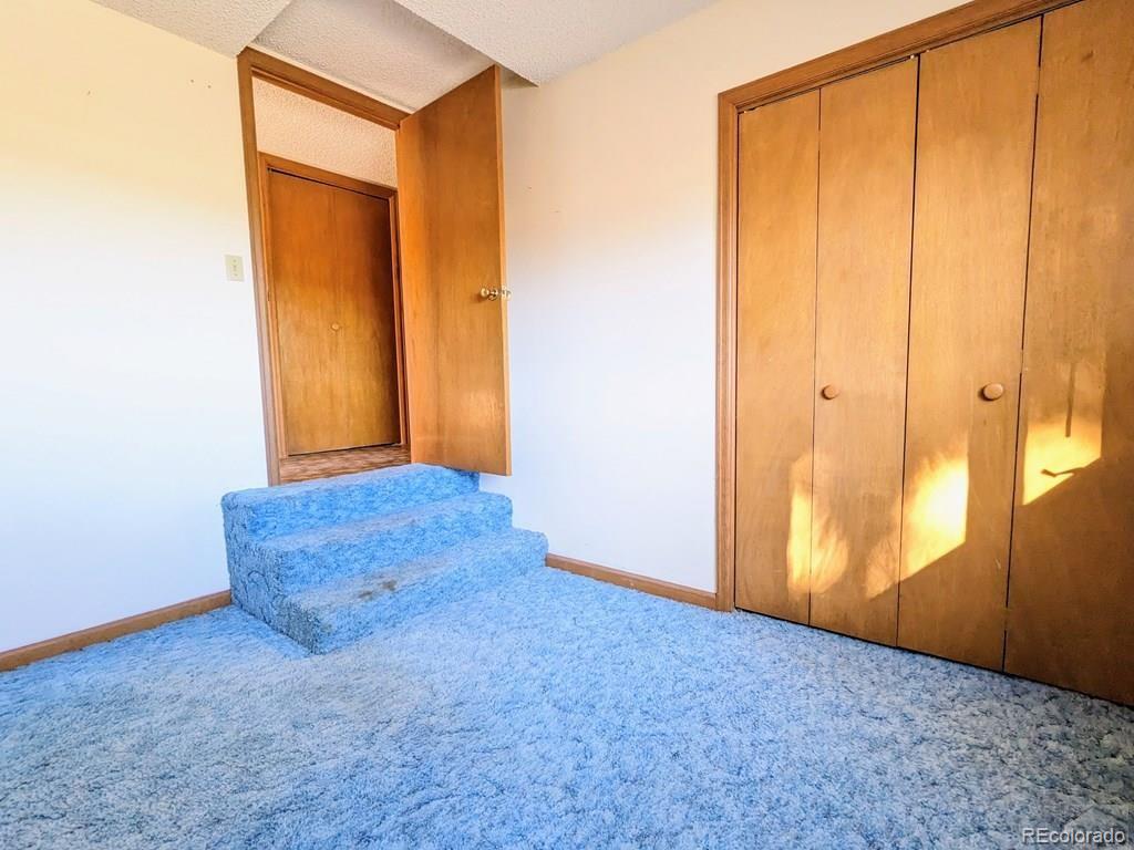 8140 Table Mountain Road Rye, CO 81069 - Photo 24 of 49 an empty room with window