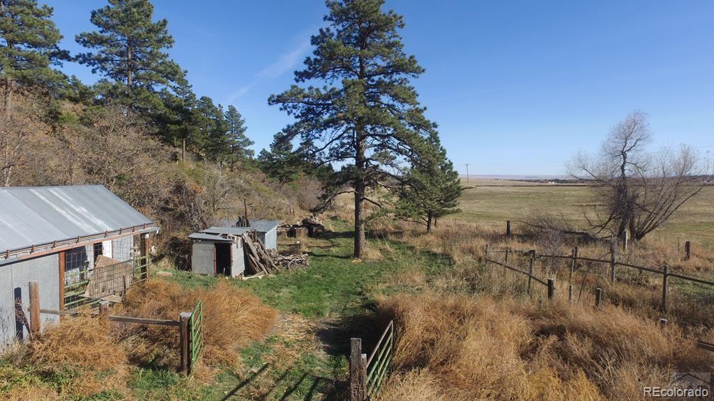 8140 Table Mountain Road Rye, CO 81069 - Photo 35 of 49 a view of a house with a yard