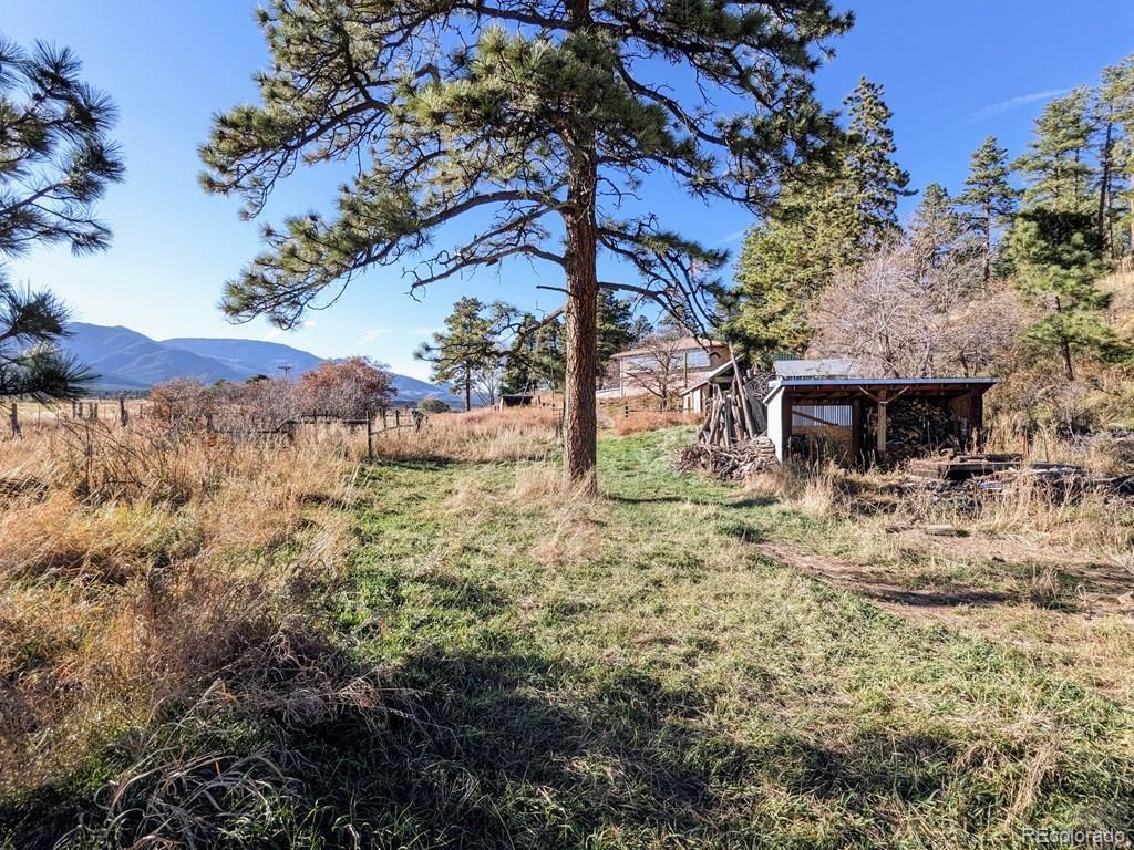 8140 Table Mountain Road Rye, CO 81069 - Photo 41 of 49 a view of a house with a yard