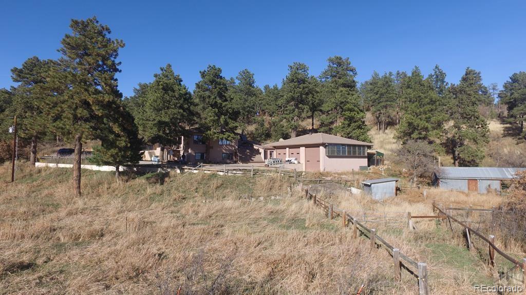 8140 Table Mountain Road Rye, CO 81069 - Photo 42 of 49 a view of a house with a yard and tree s