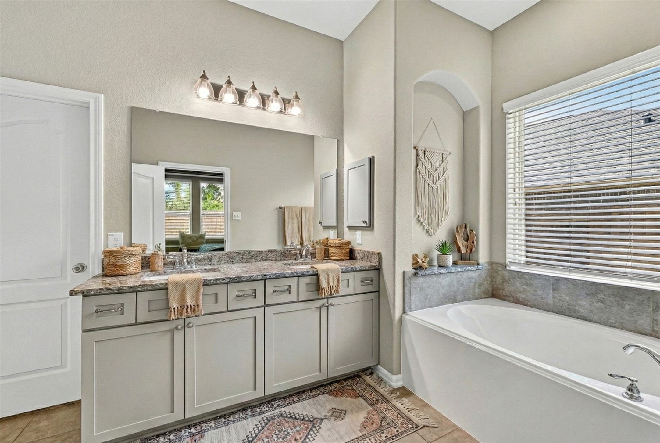 12751 Sweet Root Lane Humble, TX 77346 - Photo 12 of 29 a kitchen with a sink stove and cabinets