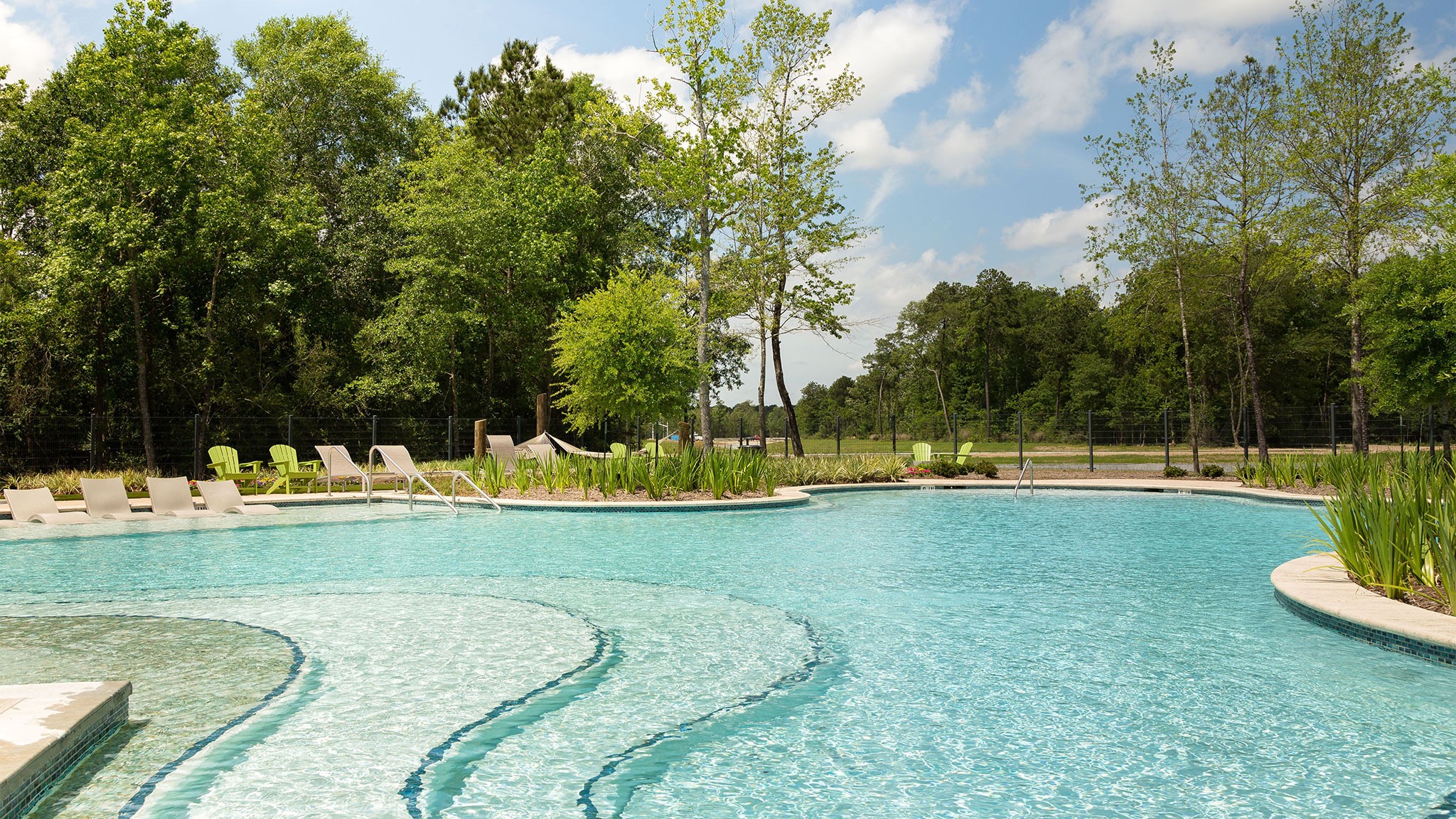 12751 Sweet Root Lane Humble, TX 77346 - Photo 27 of 29 a view of a swimming pool with a yard
