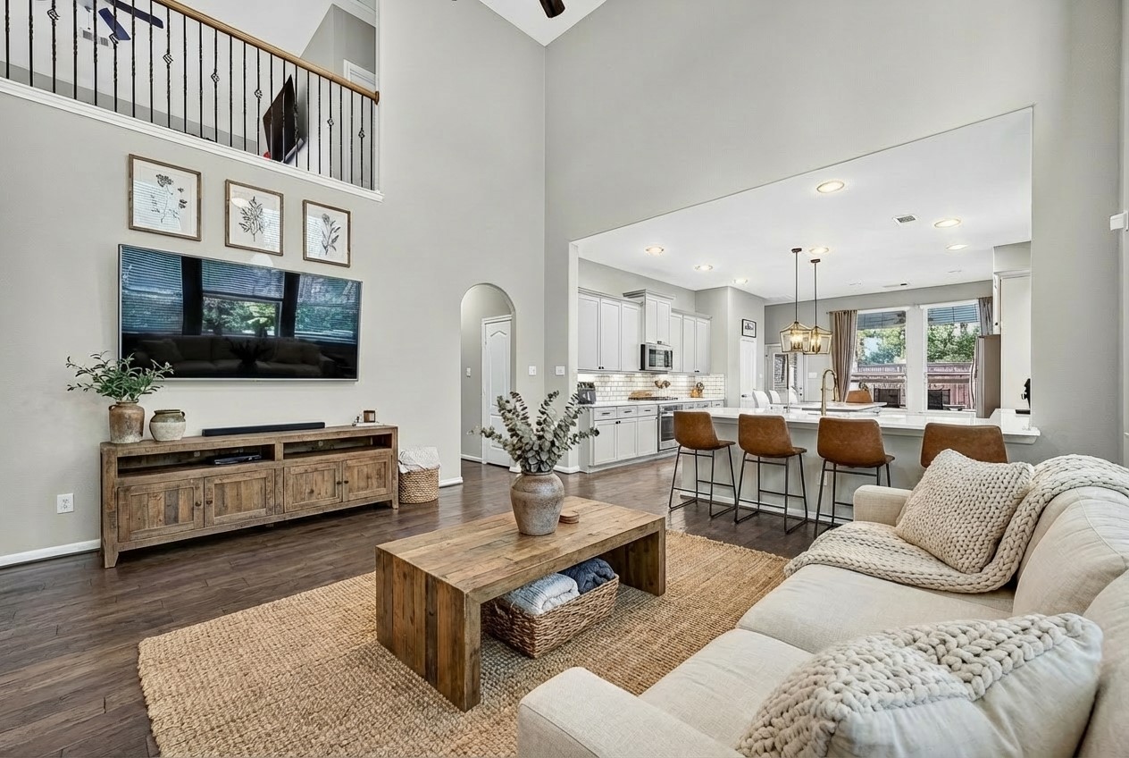 12751 Sweet Root Lane Humble, TX 77346 - Photo 6 of 29 a living room with furniture wooden floor and a flat screen tv