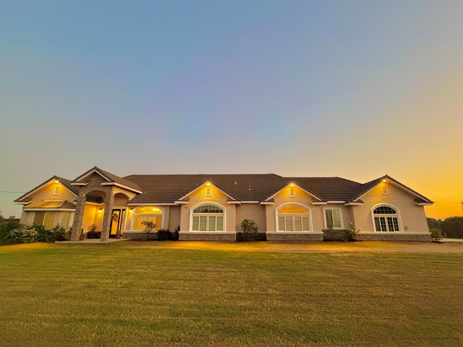 a front view of a house with a ocean view