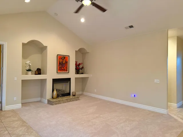 a view of a livingroom with a workspace