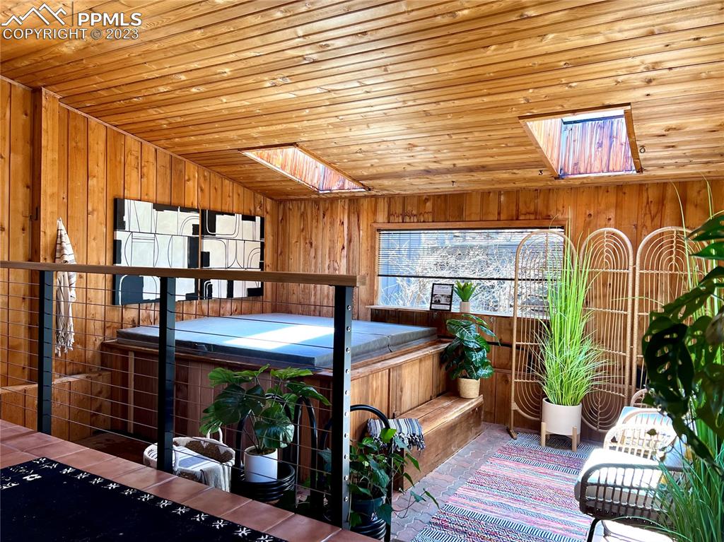 9660 Mohawk Trail Cascade, CO 80809 - Photo 7 of 42 a view of a porch with seating space