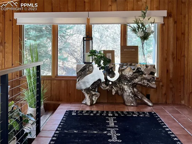 a view of a living room with furniture