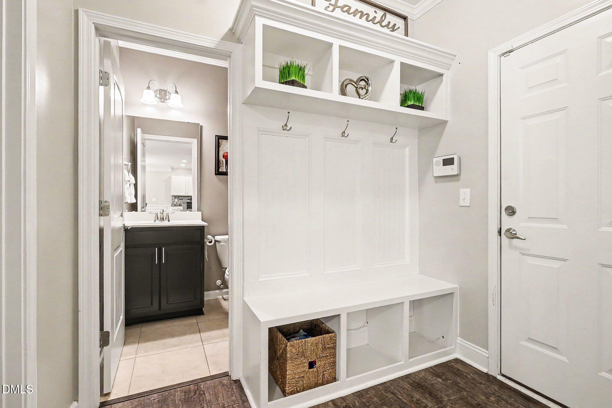 4366 Auburn Hills Drive Raleigh, NC 27616 - Photo 24 of 40 a bathroom with a double vanity sink and mirror