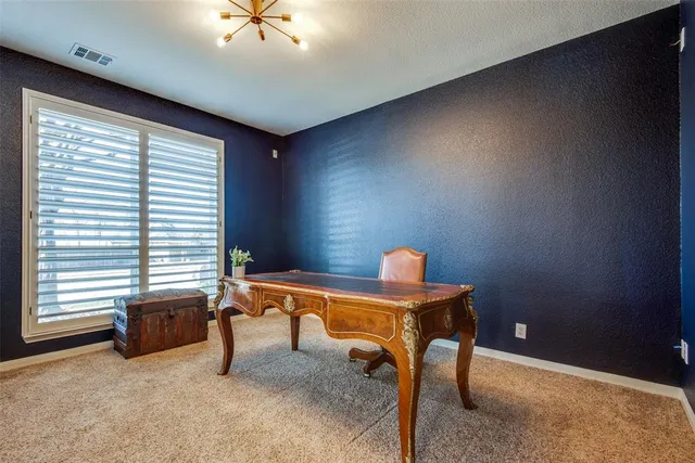 a room with furniture and a window