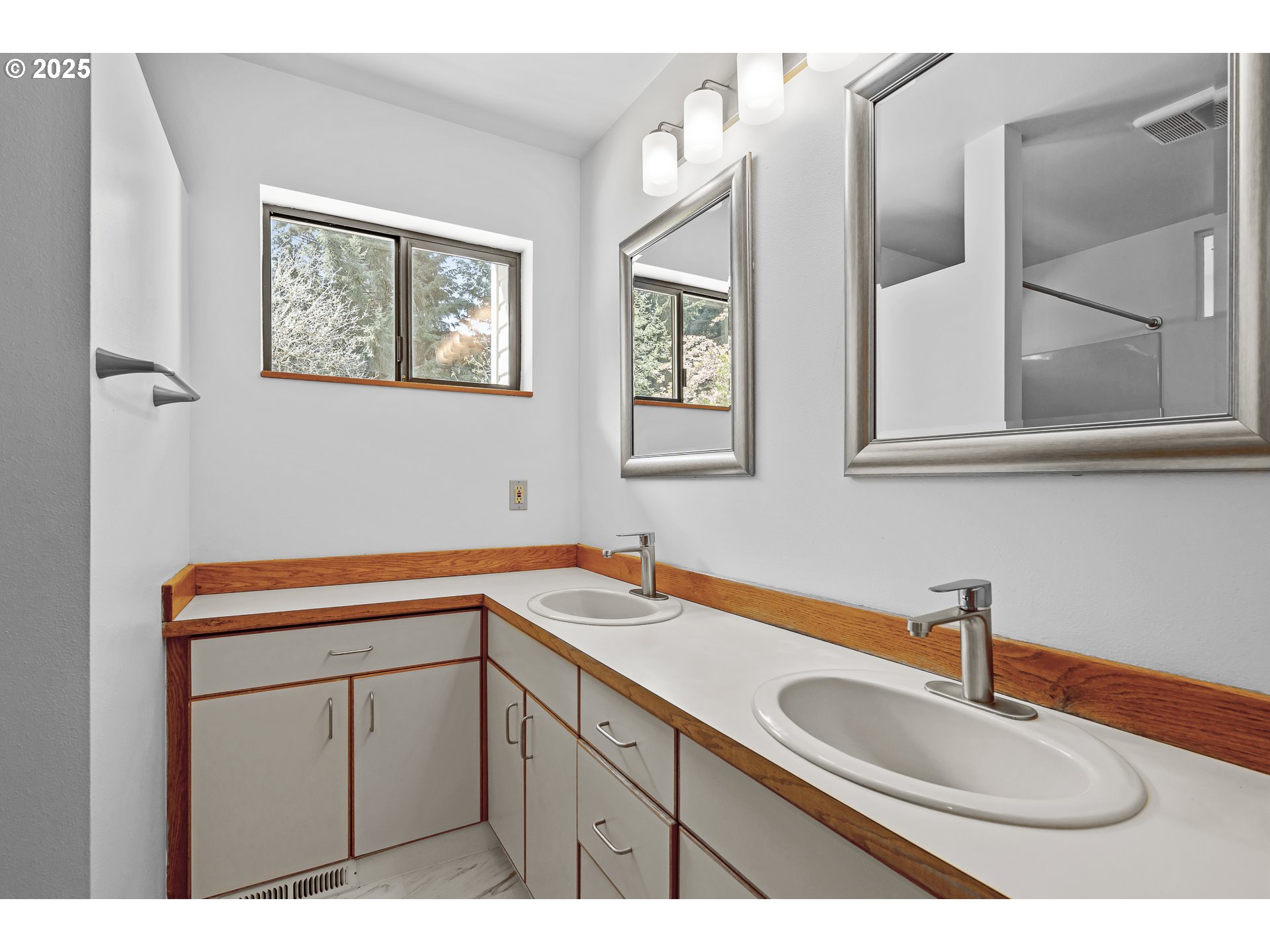25731 Southwest Neill Road Newberg, OR 97132 - Photo 15 of 39 a bathroom with a sink and a mirror