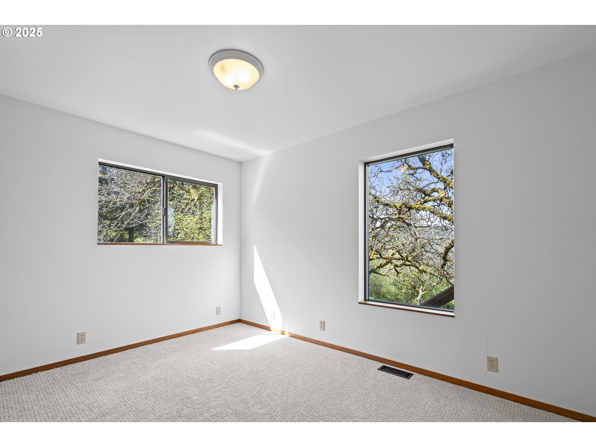 25731 Southwest Neill Road Newberg, OR 97132 - Photo 17 of 39 a view of an empty room with a window