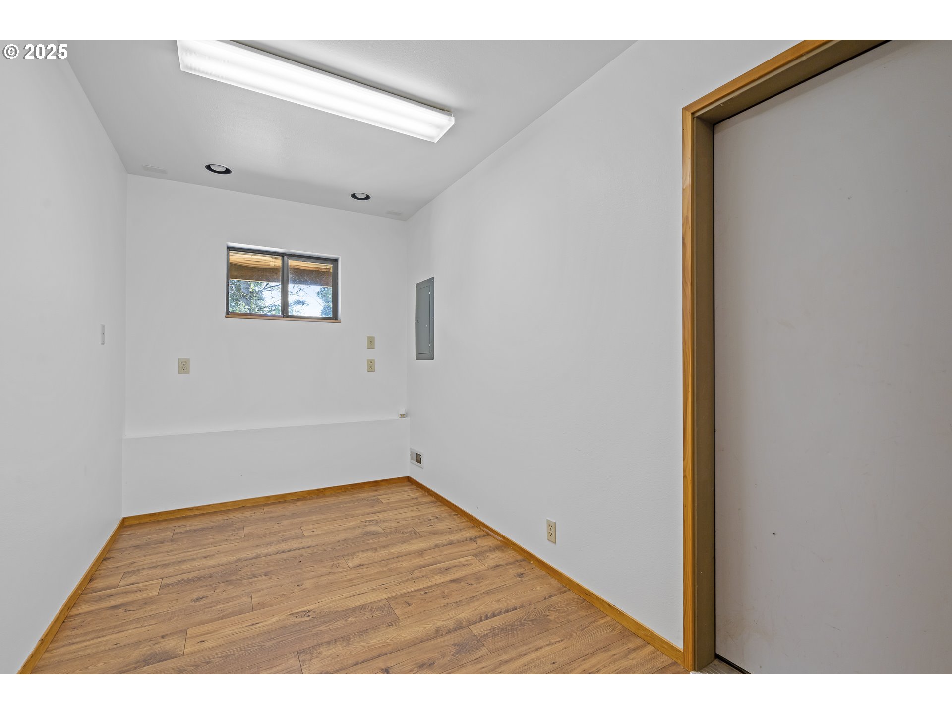 25731 Southwest Neill Road Newberg, OR 97132 - Photo 22 of 39 a view of empty room with wooden floor