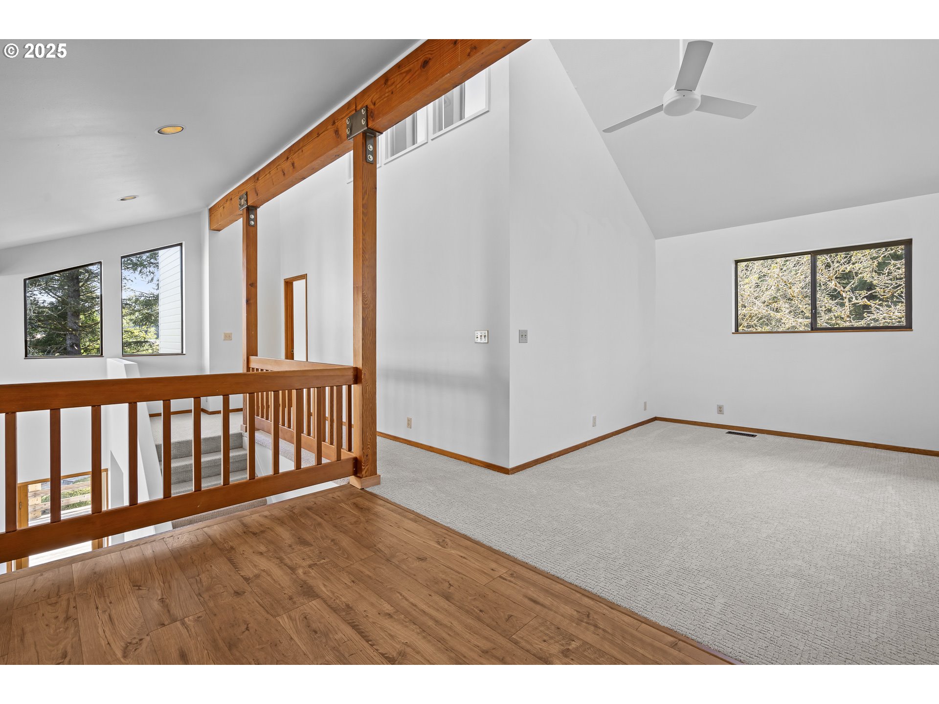 25731 Southwest Neill Road Newberg, OR 97132 - Photo 26 of 39 a view of an empty room with wooden floor and a window