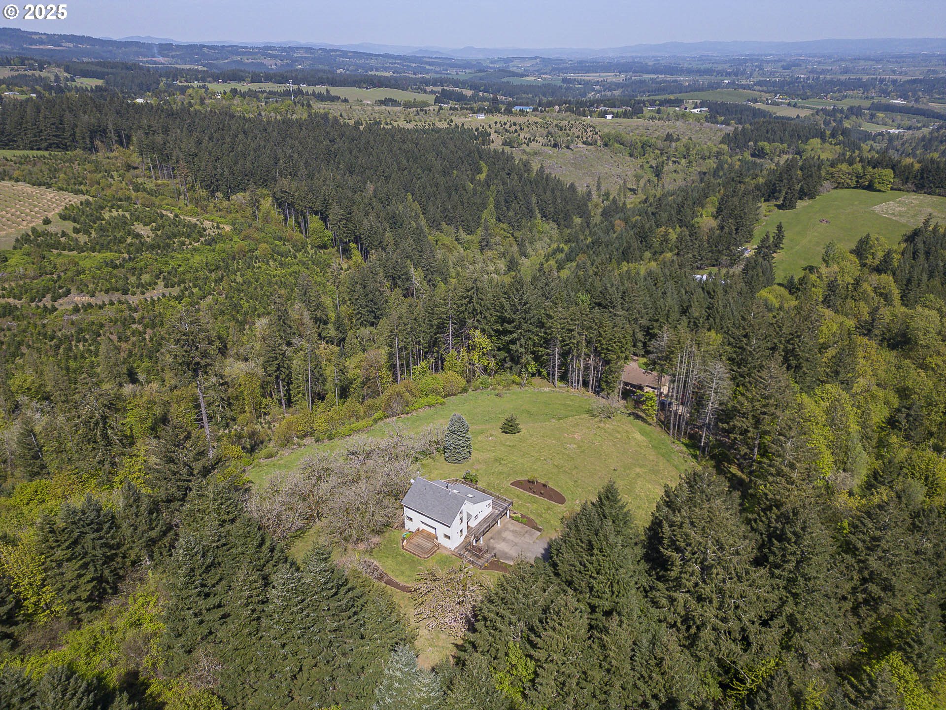 25731 Southwest Neill Road Newberg, OR 97132 - Photo 39 of 39 a view of a lake with mountains in the background