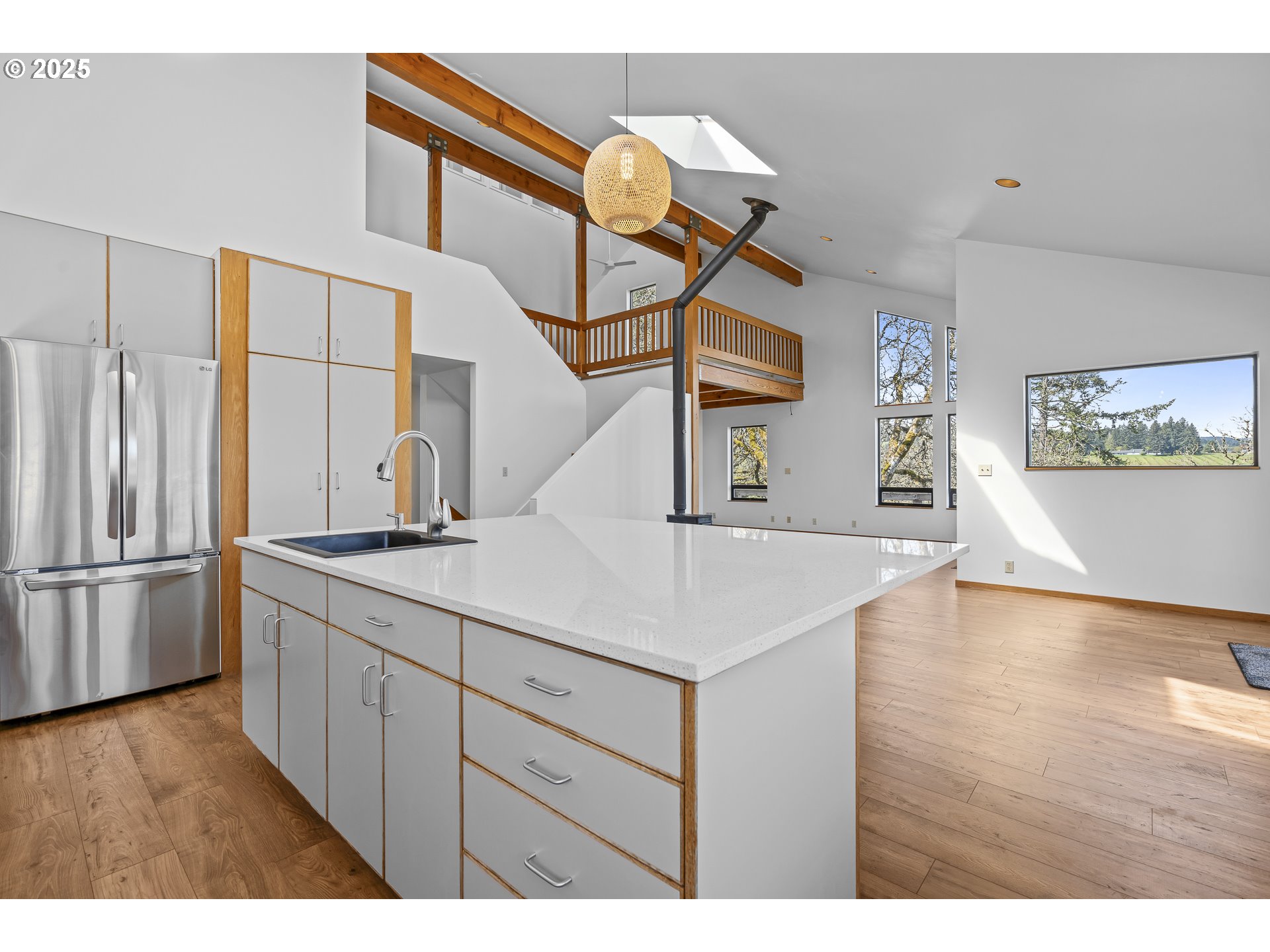25731 Southwest Neill Road Newberg, OR 97132 - Photo 5 of 39 a kitchen with a sink stainless steel appliances and cabinets