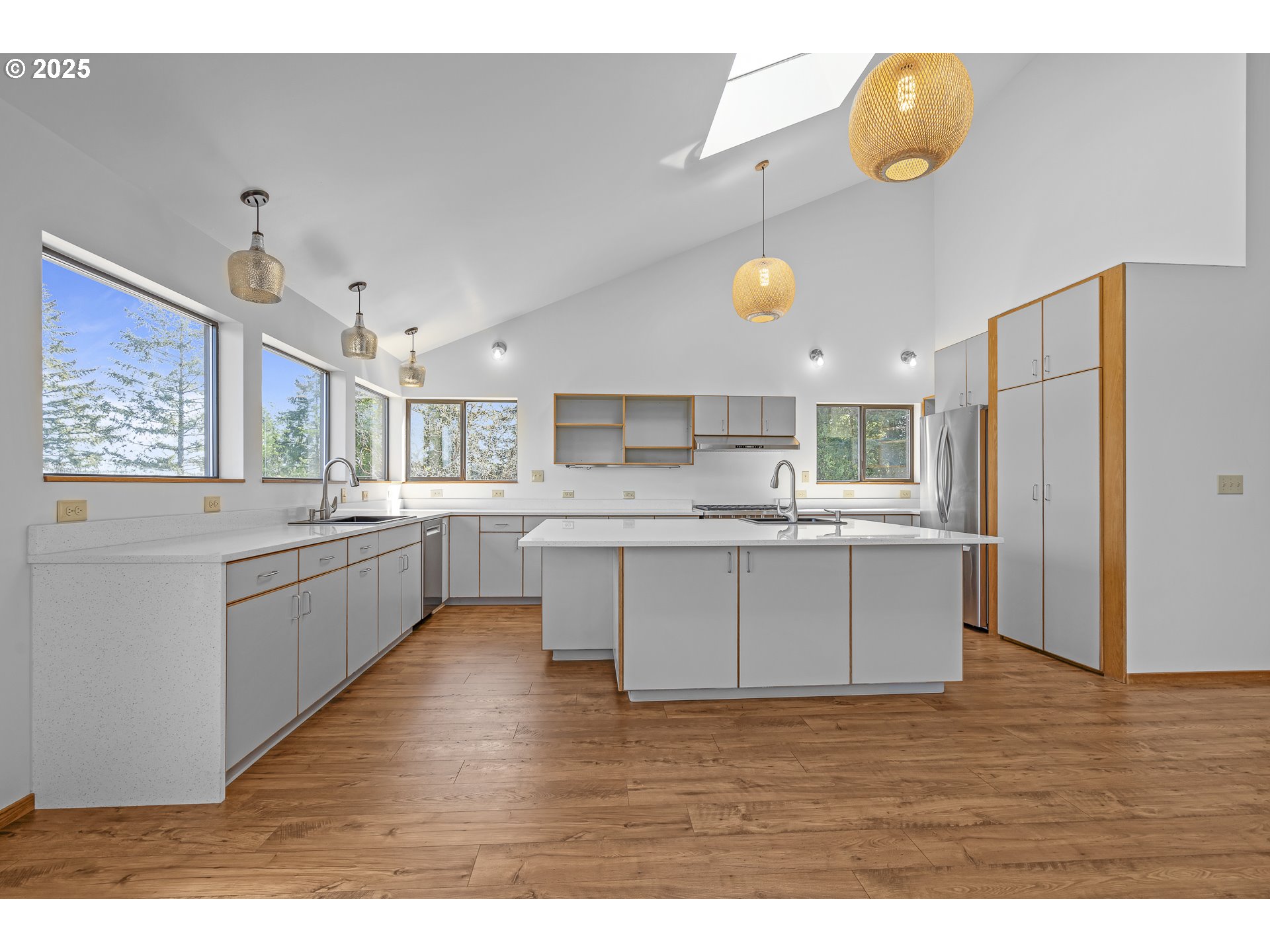 25731 Southwest Neill Road Newberg, OR 97132 - Photo 7 of 39 a kitchen with a sink cabinets and wooden floor