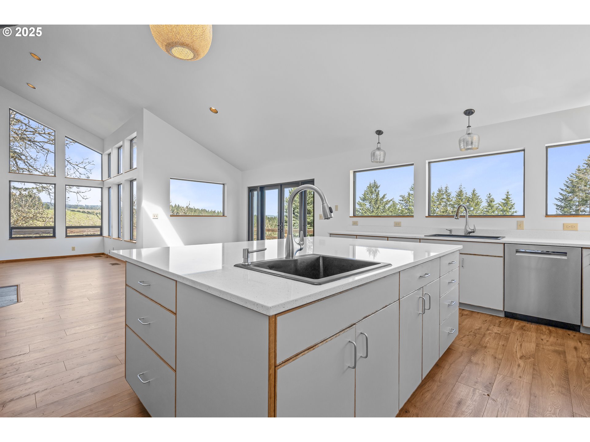 25731 Southwest Neill Road Newberg, OR 97132 - Photo 9 of 39 a kitchen with a sink and cabinets