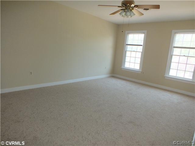 10716 Warren Road Glen Allen, VA 23060 - Photo 8 of 13 Master Bedroom - Walk in closet and en suite bath.
